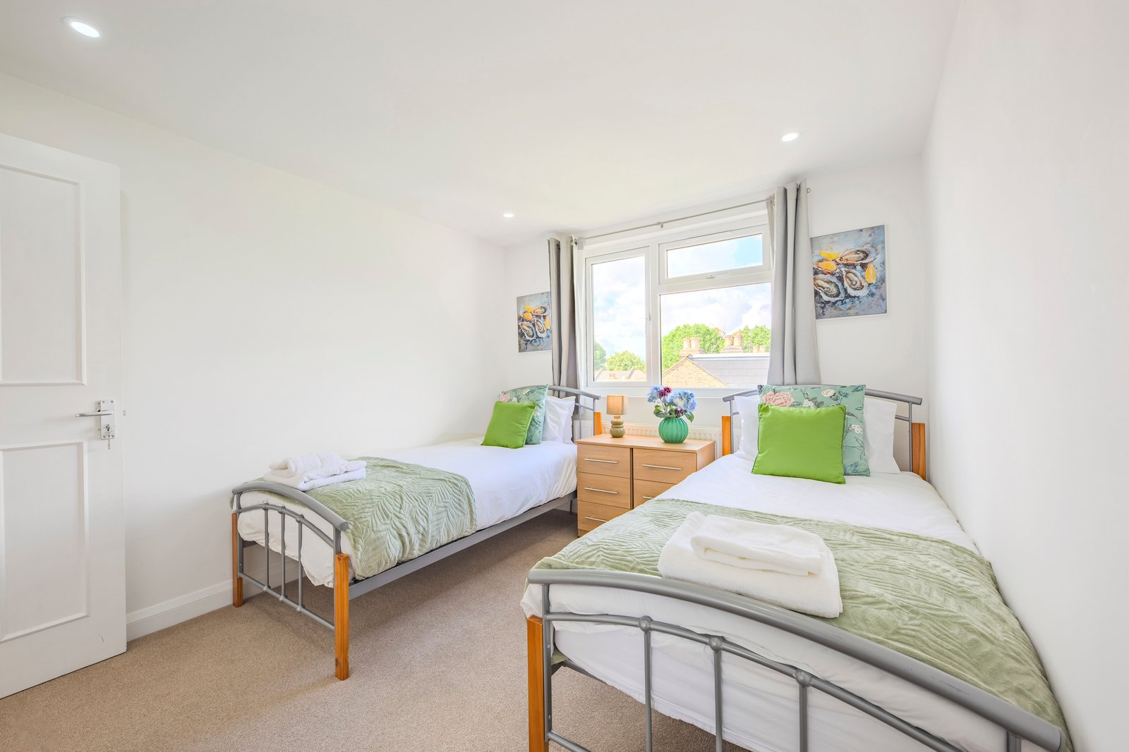 Bedroom 4 — green room, twin beds